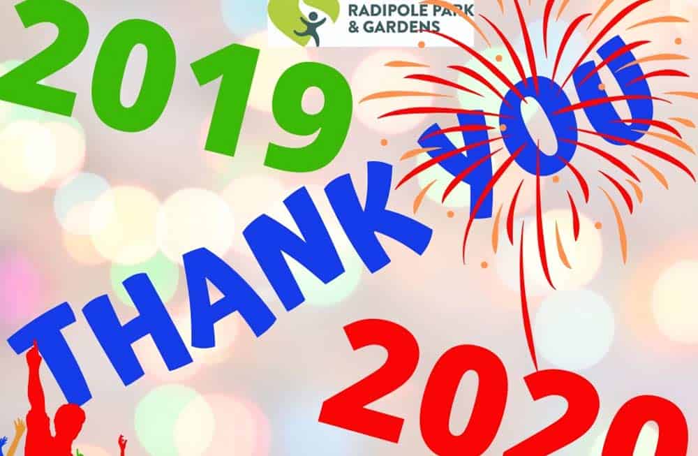 A colorful graphic celebrating the transition from 2019 to 2020 with fireworks, bubbles, and text saying "thank," likely part of "thank you.